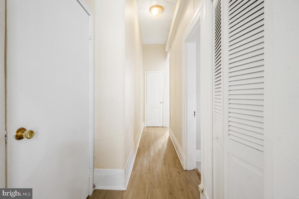 471 Florida Avenue Northwest, Unit 1 Washington, DC 20001 - Photo 39 of 39 a view of a bathroom from a corridor