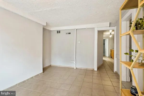 a kitchen with stainless steel appliances a refrigerator and a sink