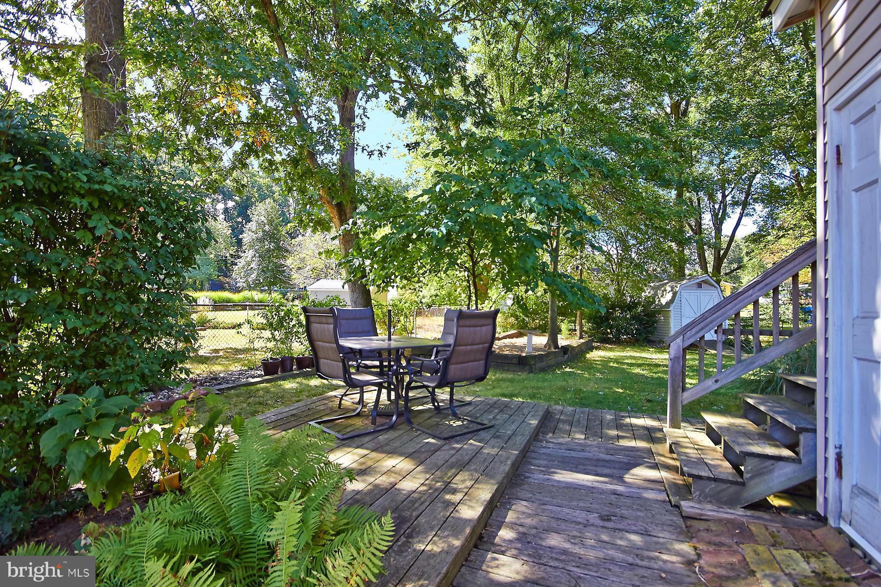 413 Branch Road Southeast Vienna, VA 22180 - Photo 14 of 30 a view of a bench in a garden