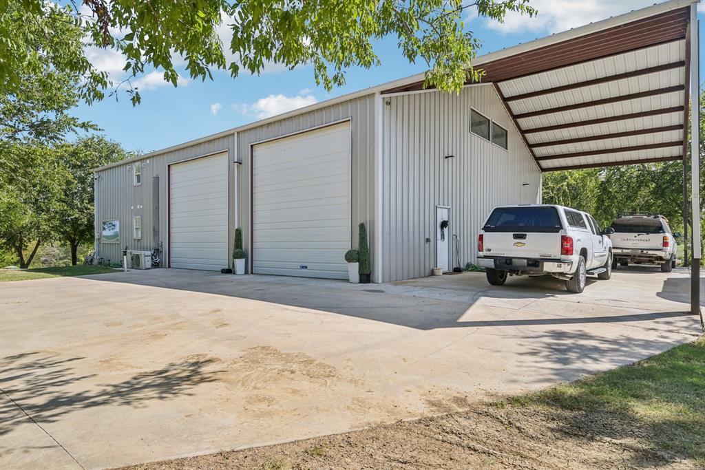 169 Chisam Road Valley View, TX 76272 - Photo 2 of 37 a car parked in front of house