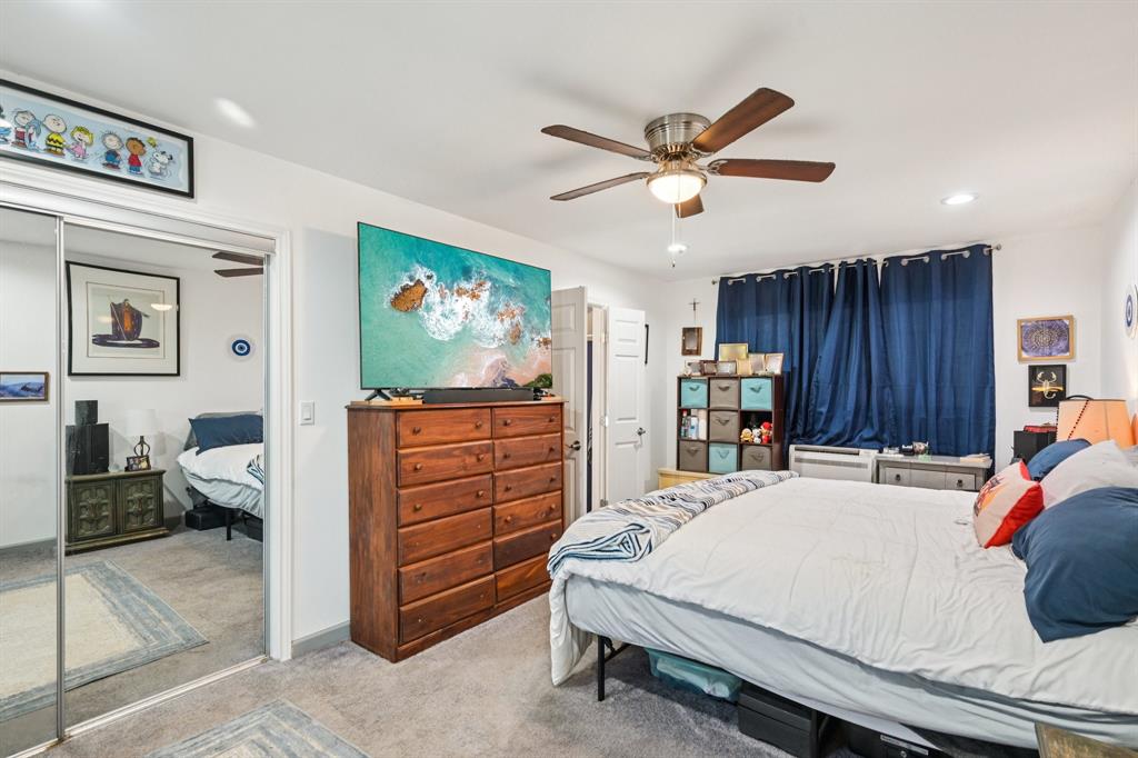 169 Chisam Road Valley View, TX 76272 - Photo 24 of 37 a bed room with a bed window and dresser