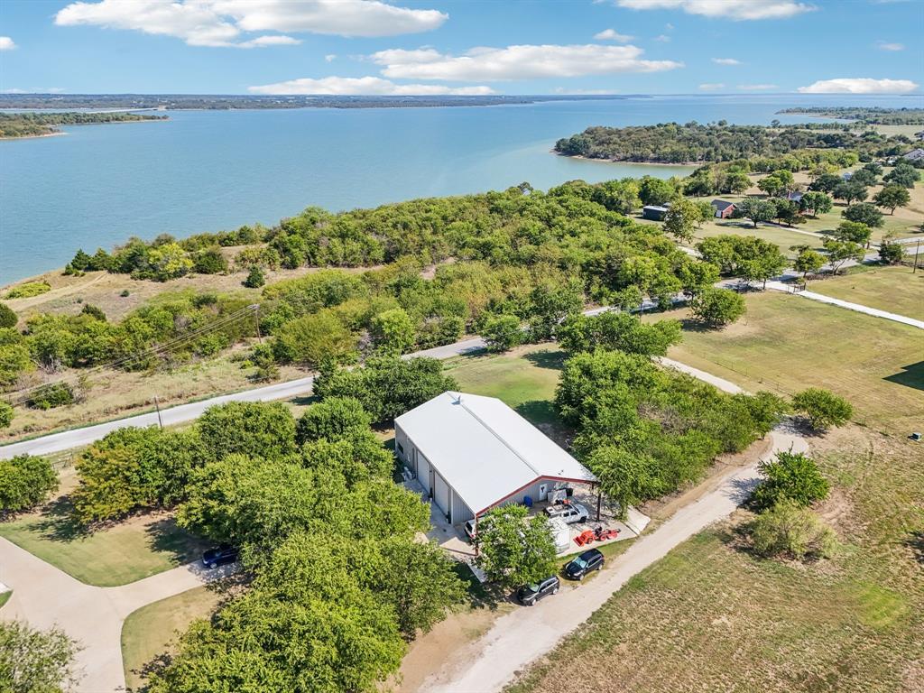 169 Chisam Road Valley View, TX 76272 - Photo 28 of 37 an aerial view of ocean with residential house with outdoor space
