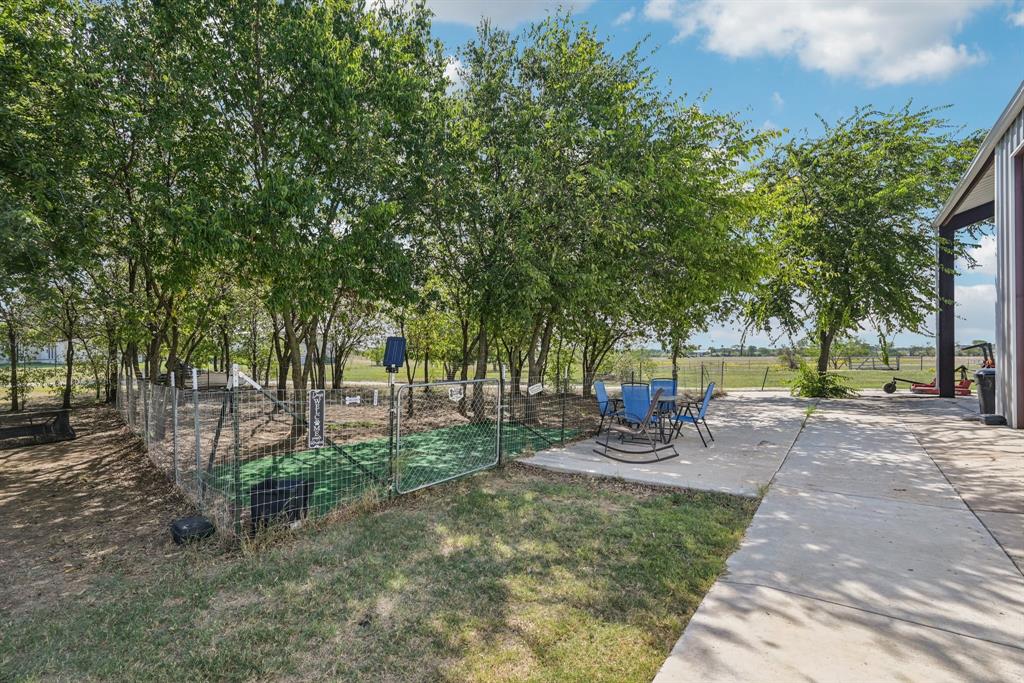 169 Chisam Road Valley View, TX 76272 - Photo 33 of 37 a view of a park with bench and trees