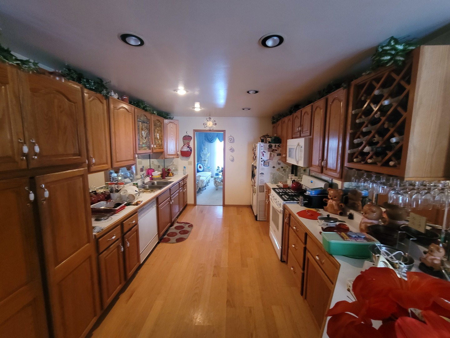 3246 East Forestview Trail Crete, IL 60417 - Photo 7 of 12 a kitchen with stainless steel appliances kitchen island granite countertop a stove and a refrigerator