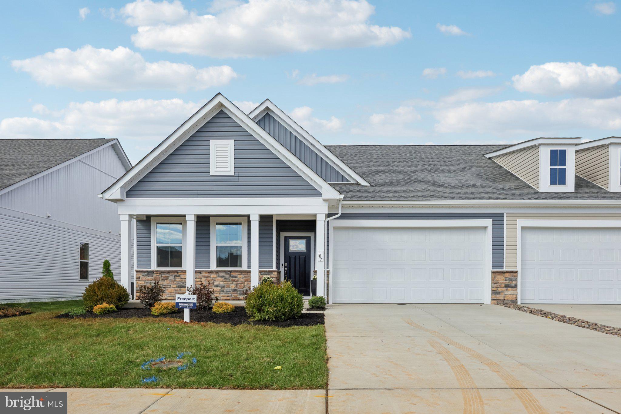 108 Trellis View Lane Winchester, VA 22602 - Photo 29 of 45 a front view of a house with a yard and garage