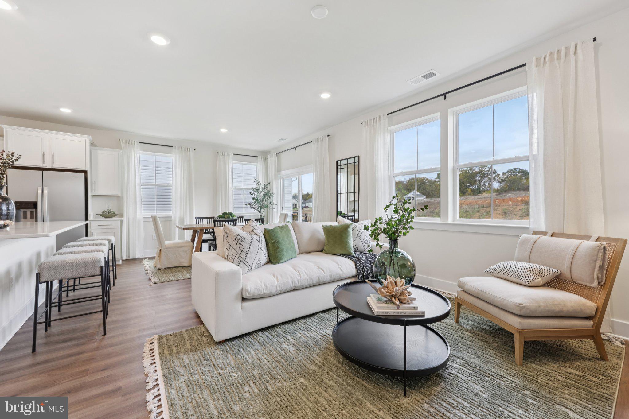 108 Trellis View Lane Winchester, VA 22602 - Photo 8 of 45 a living room with furniture and a large window