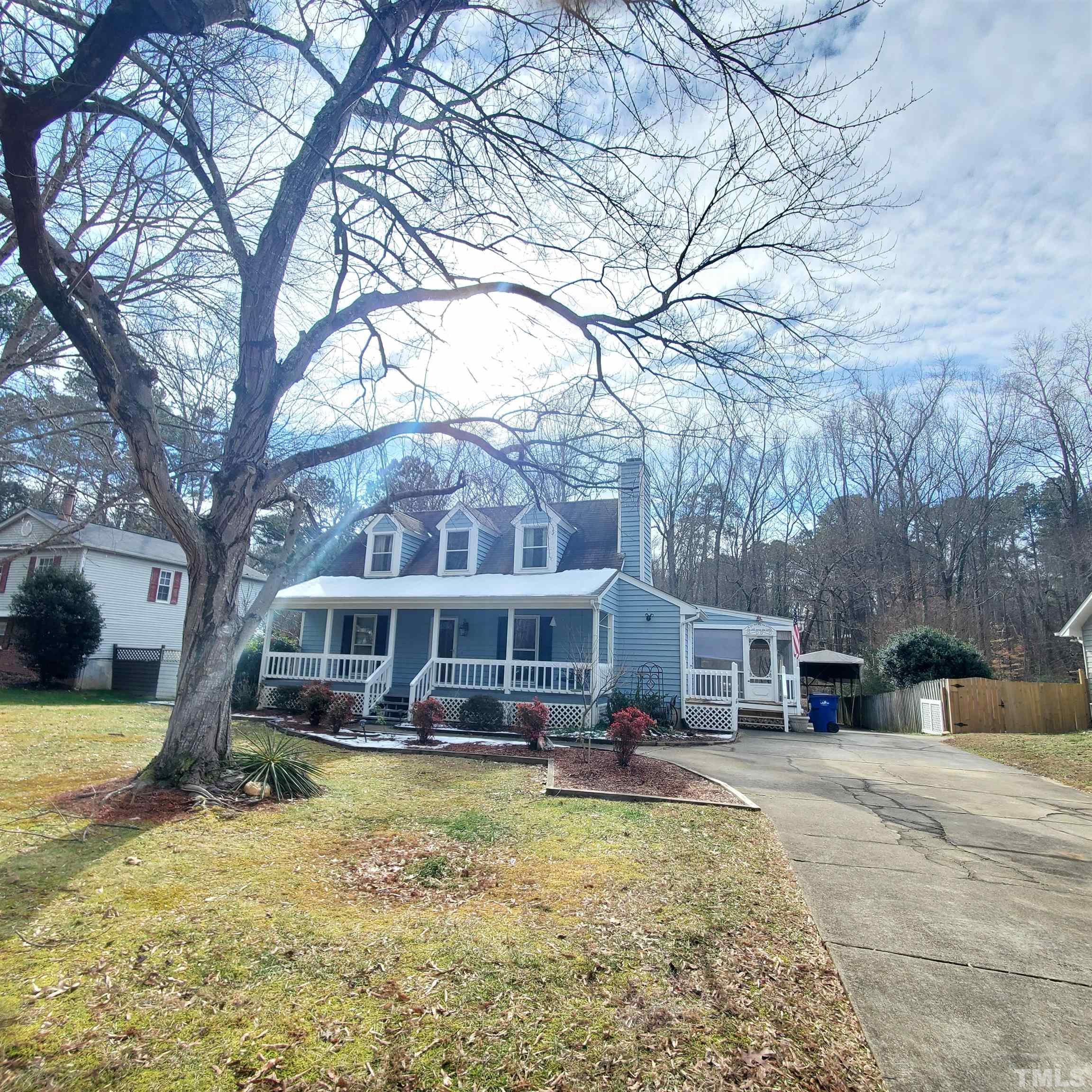 7244 Mine Shaft Road Raleigh, NC 27615 - Photo 1 of 23 a view of a house with a yard covered in snow