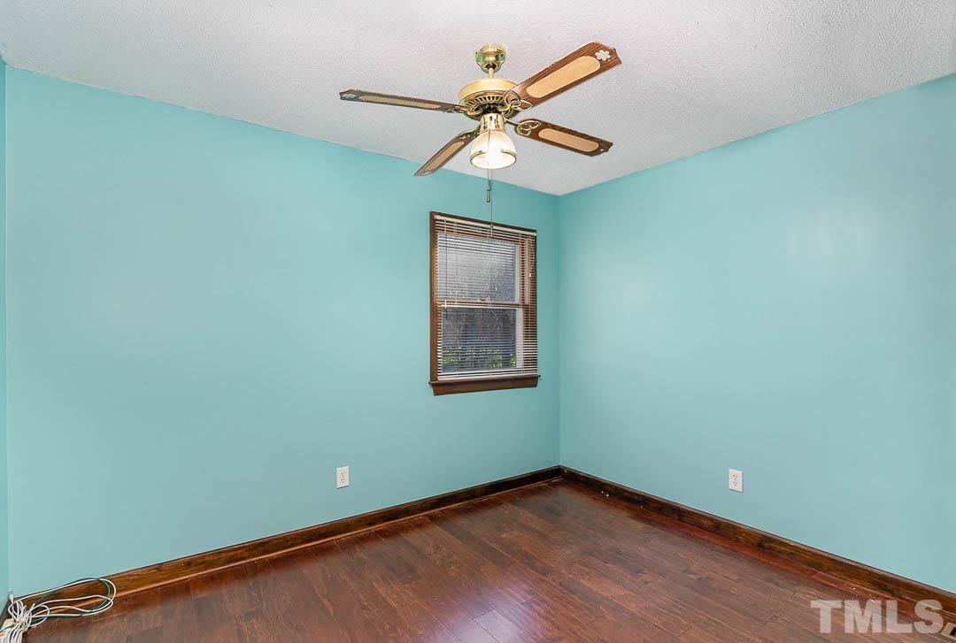 7244 Mine Shaft Road Raleigh, NC 27615 - Photo 13 of 23 a view of a room with a fan