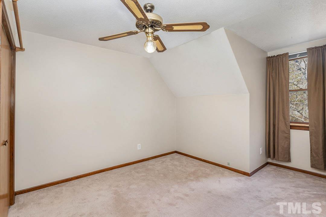 7244 Mine Shaft Road Raleigh, NC 27615 - Photo 16 of 23 a view of a room with rack on the wall