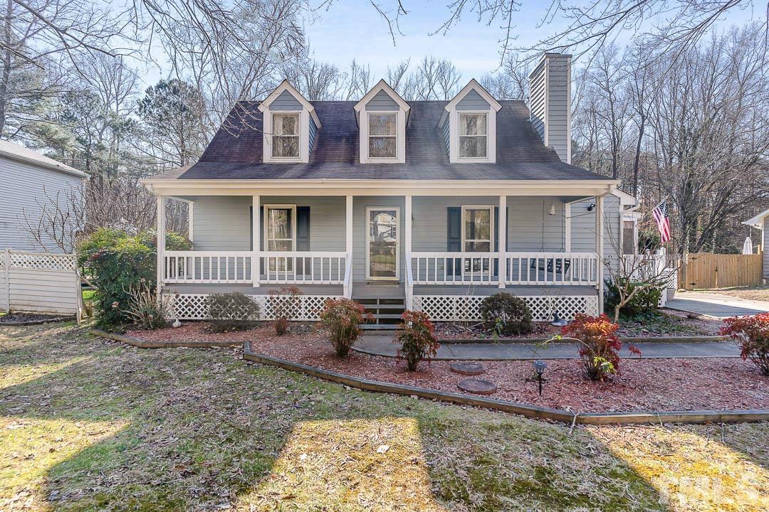 7244 Mine Shaft Road Raleigh, NC 27615 - Photo 17 of 23 a front view of a house with a yard
