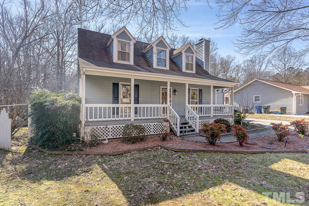 7244 Mine Shaft Road Raleigh, NC 27615 - Photo 19 of 23 a front view of a house with a yard