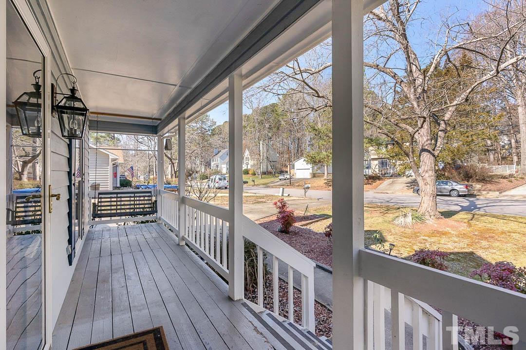 7244 Mine Shaft Road Raleigh, NC 27615 - Photo 20 of 23 a view of a balcony with wooden floor