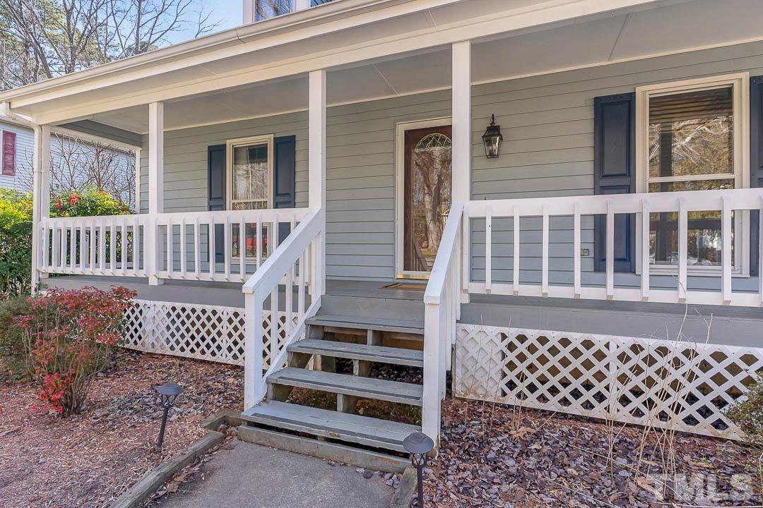 7244 Mine Shaft Road Raleigh, NC 27615 - Photo 21 of 23 a front view of a house with a window
