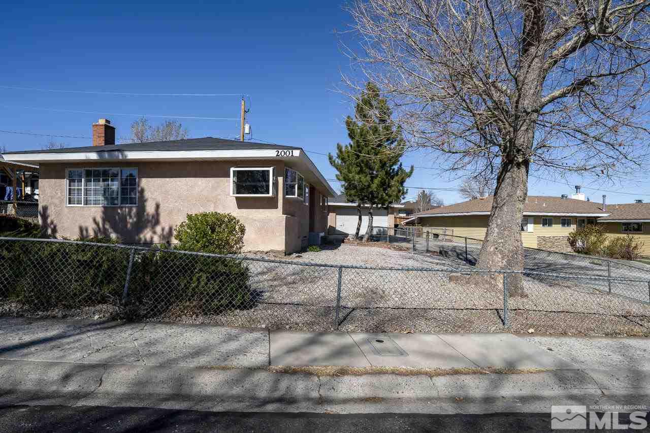 2001 Arcane Avenue Reno, NV 89503 - Photo 3 of 25 a front view of a house with garden