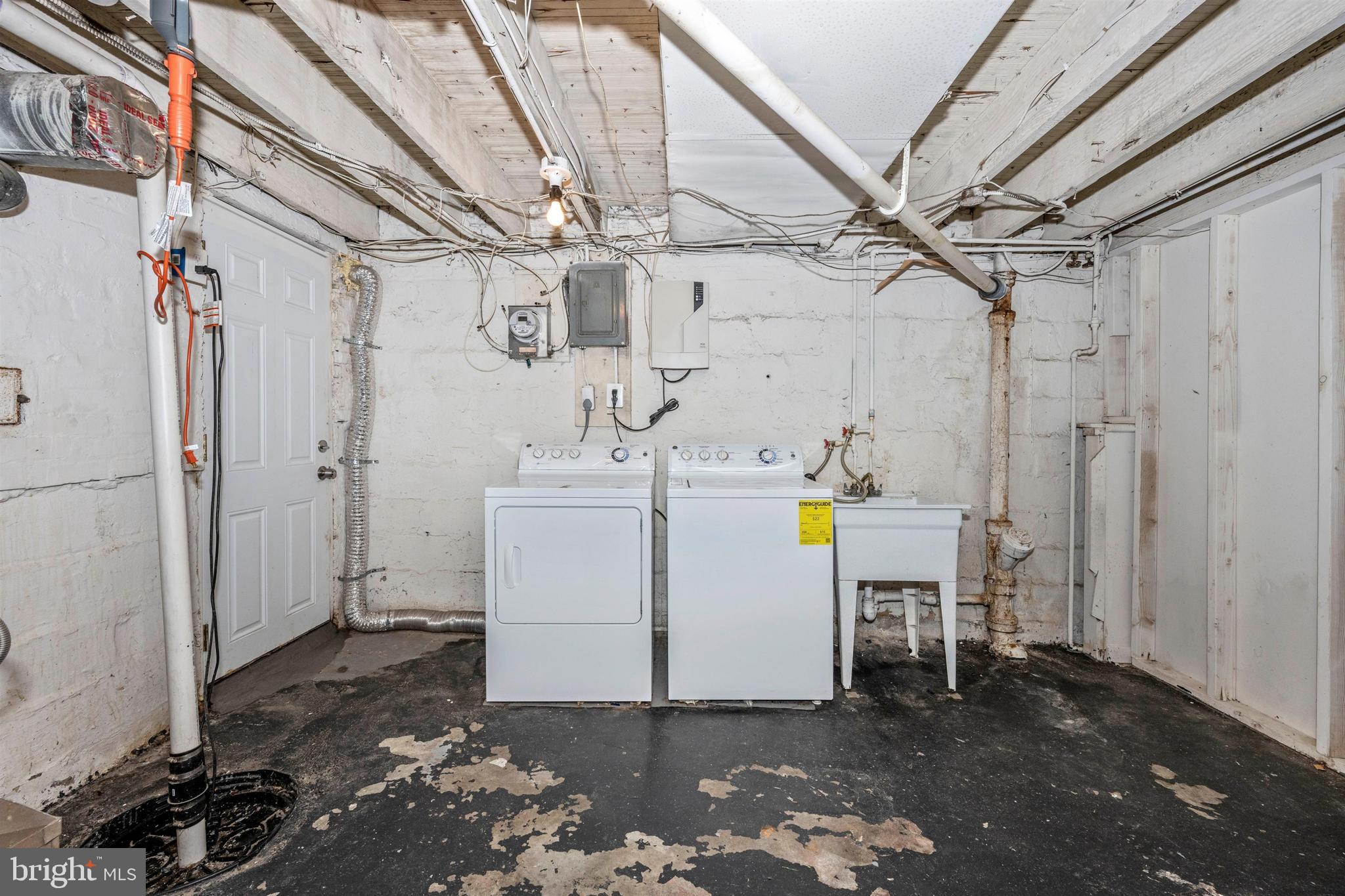 7041 Dunbar Road Dundalk, MD 21222 - Photo 24 of 28 Like new washer/dryer in basement and rear access