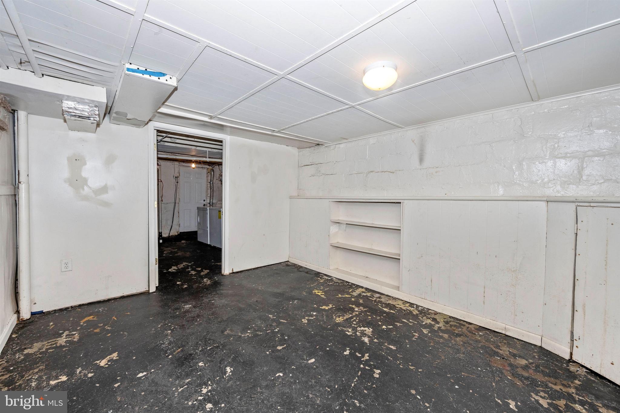 7041 Dunbar Road Dundalk, MD 21222 - Photo 26 of 28 Front room of basement