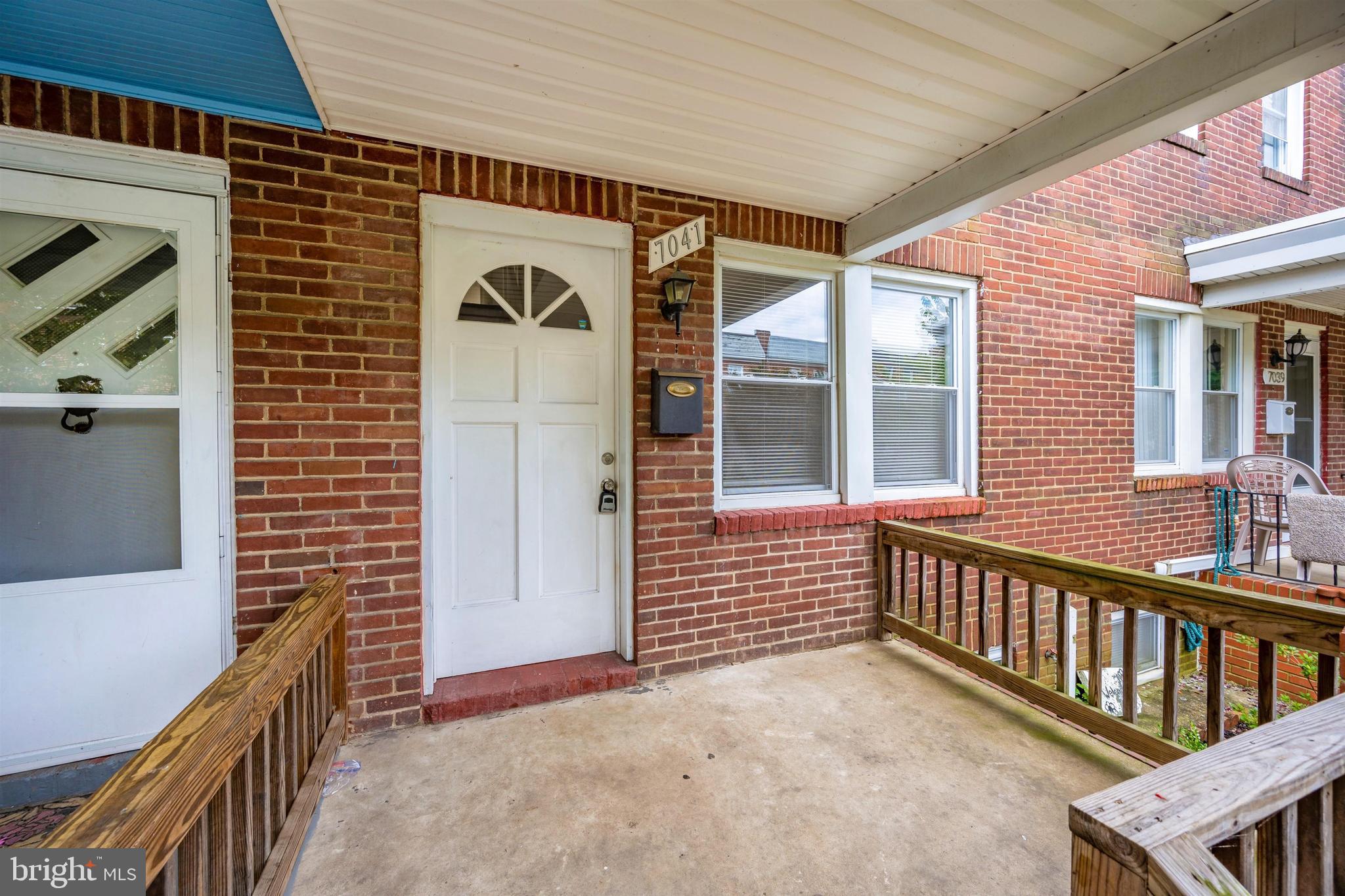 7041 Dunbar Road Dundalk, MD 21222 - Photo 4 of 28 Spacious renovated front porch