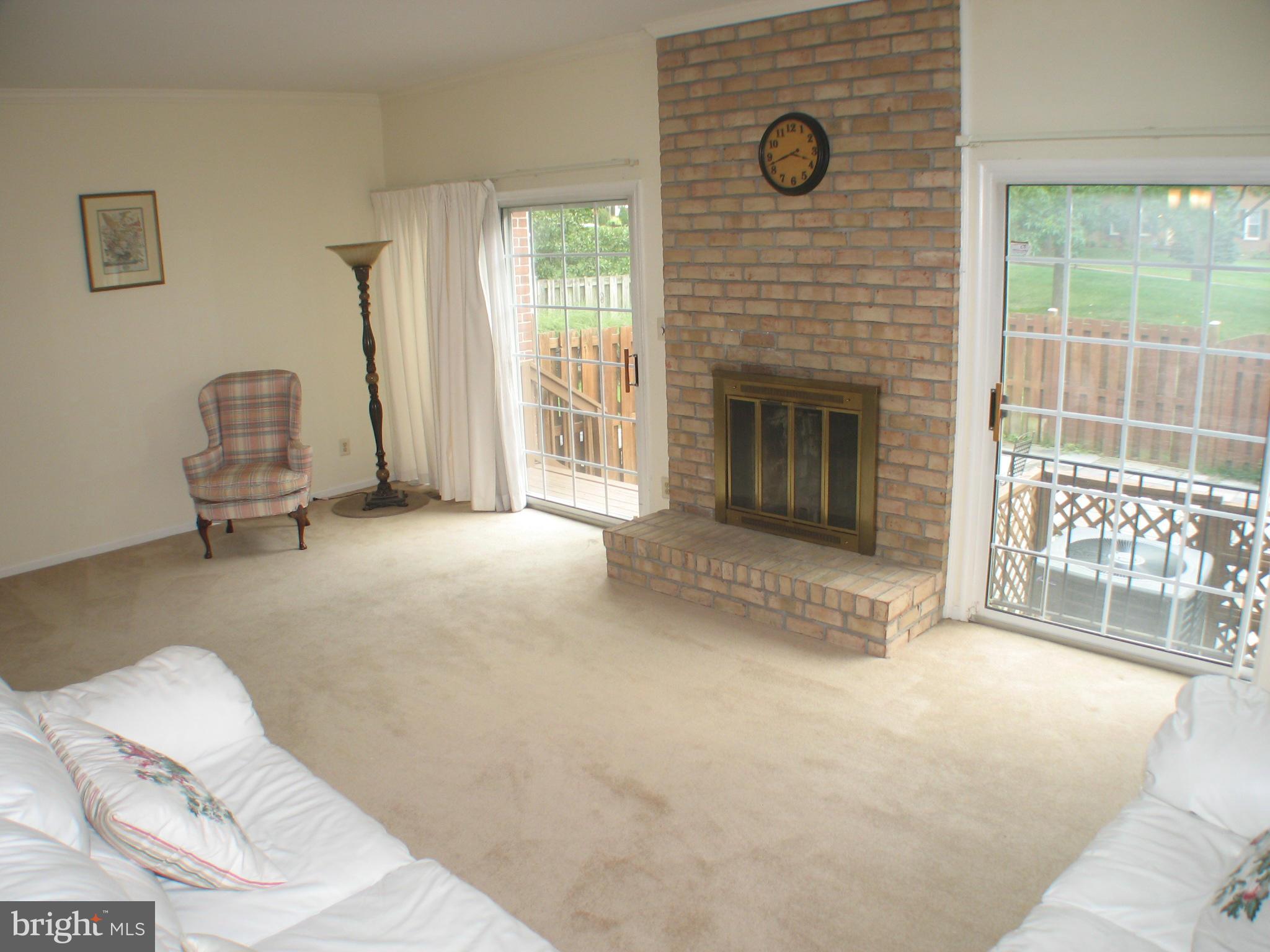 129 Charlesbrooke Road Baltimore, MD 21212 - Photo 4 of 20 24 X 14 Fireplace. Sliding glass doors to Patio