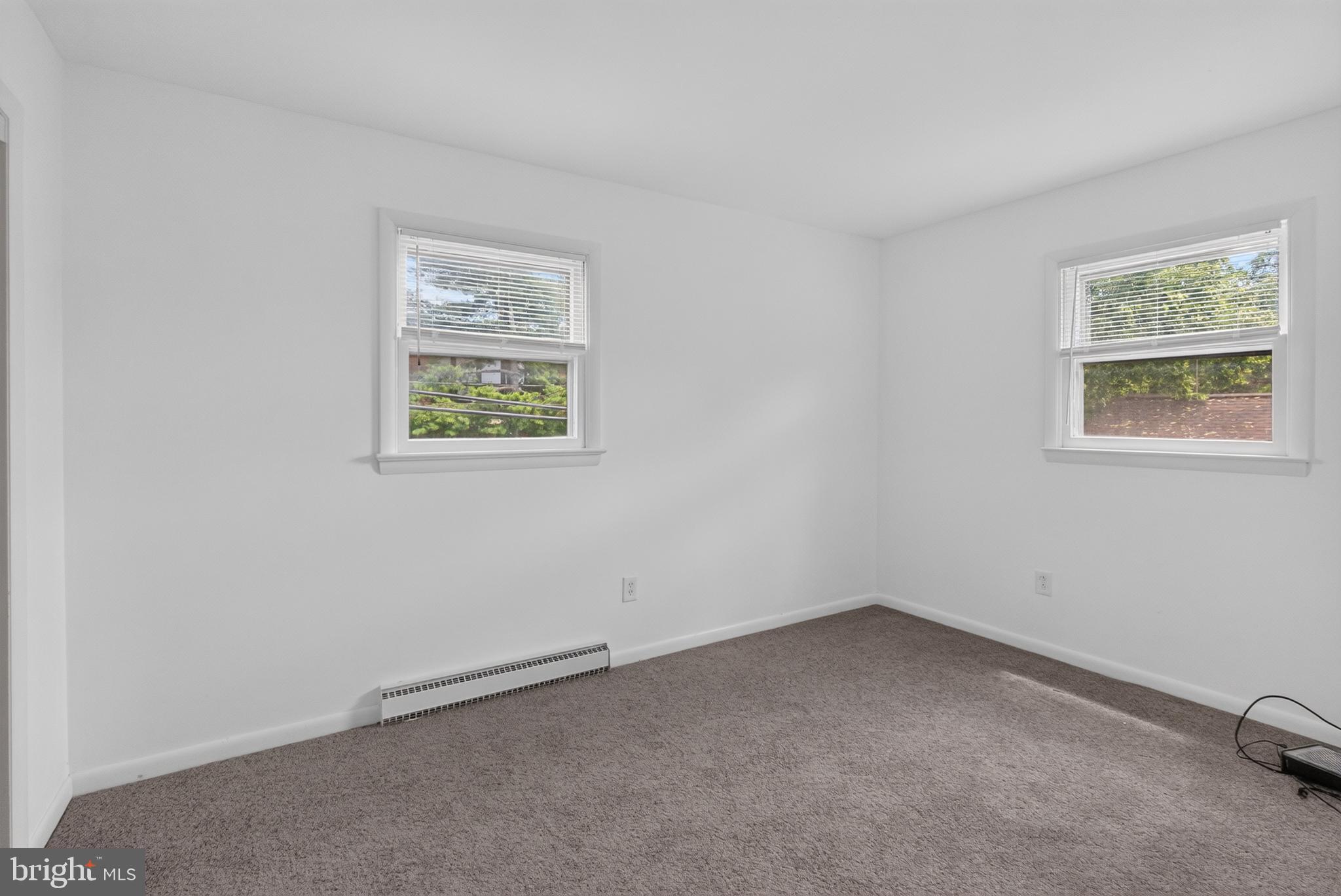 351 Calvert Street Chestertown, MD 21620 - Photo 9 of 19 an empty room with a window