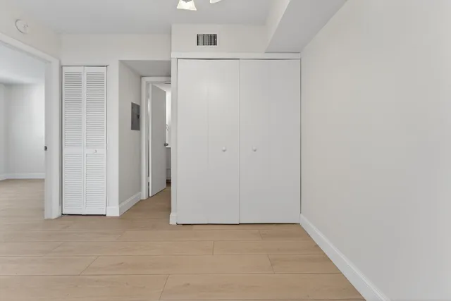 a bathroom with a shower and toilet