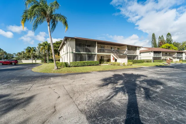 a view of a golf course with a big yard