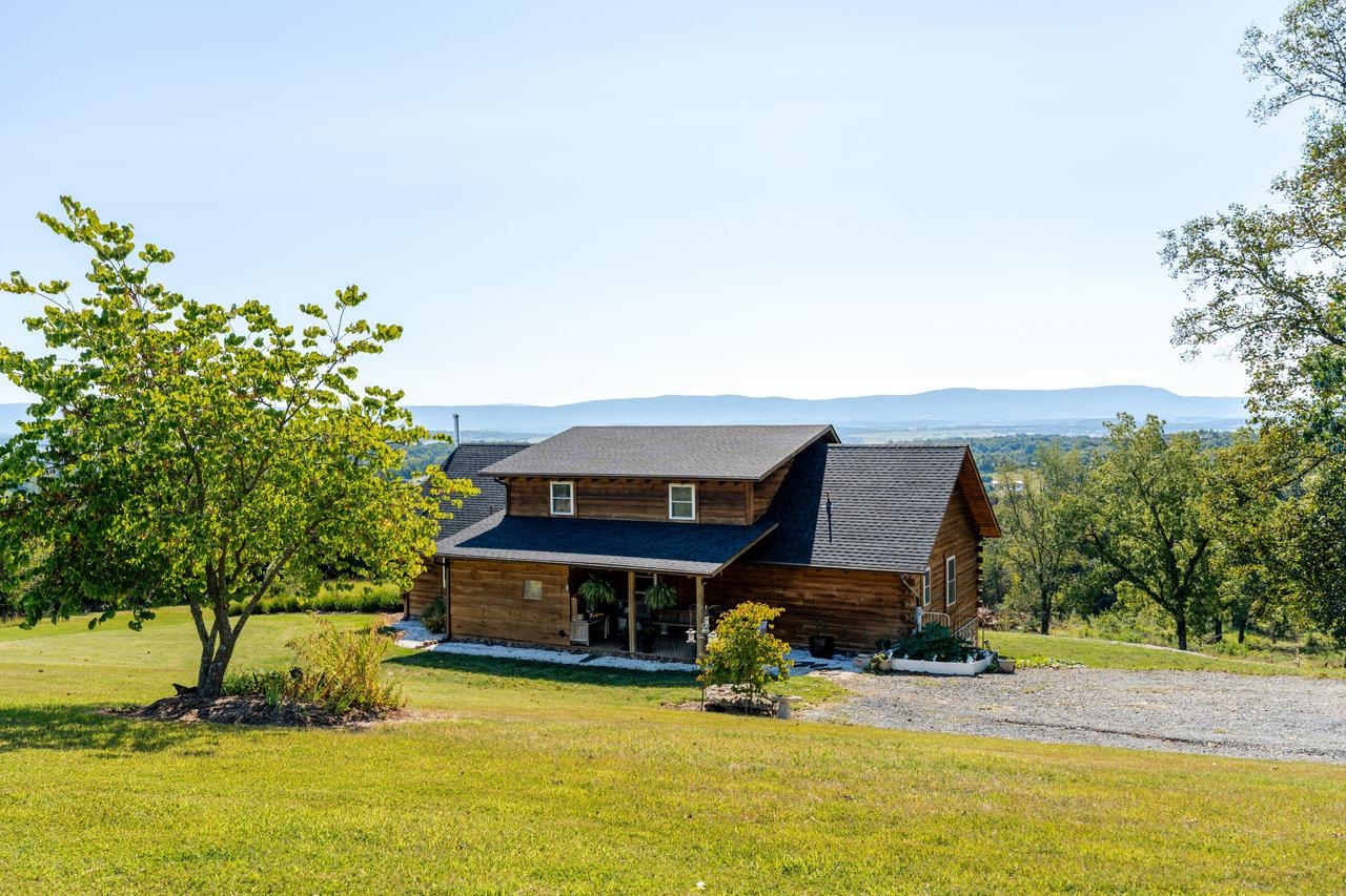 12012 Hollar School Road Linville, VA 22834 - Photo 11 of 75 a house with trees in the background