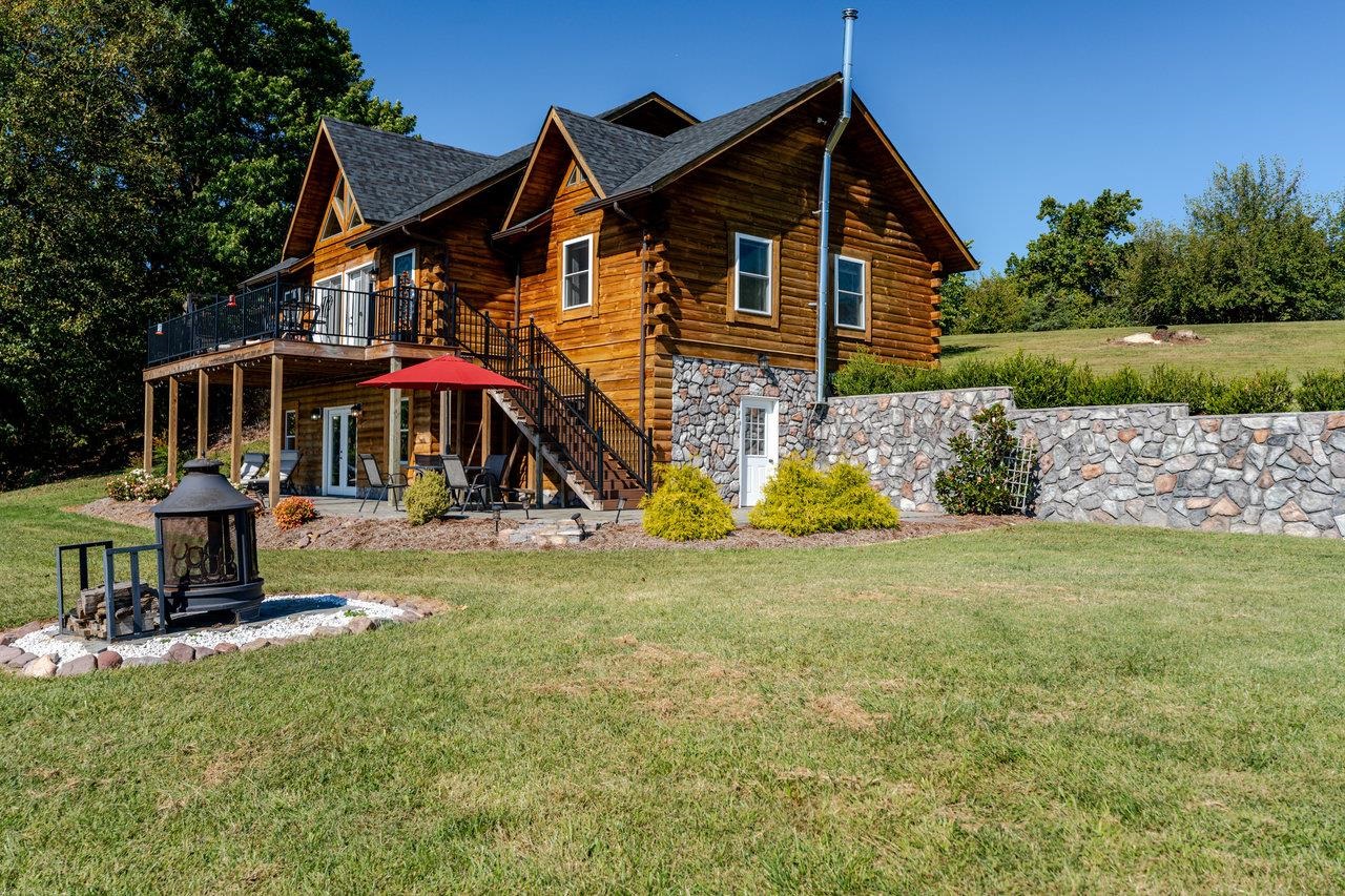 12012 Hollar School Road Linville, VA 22834 - Photo 15 of 75 a view of a house with backyard and garden