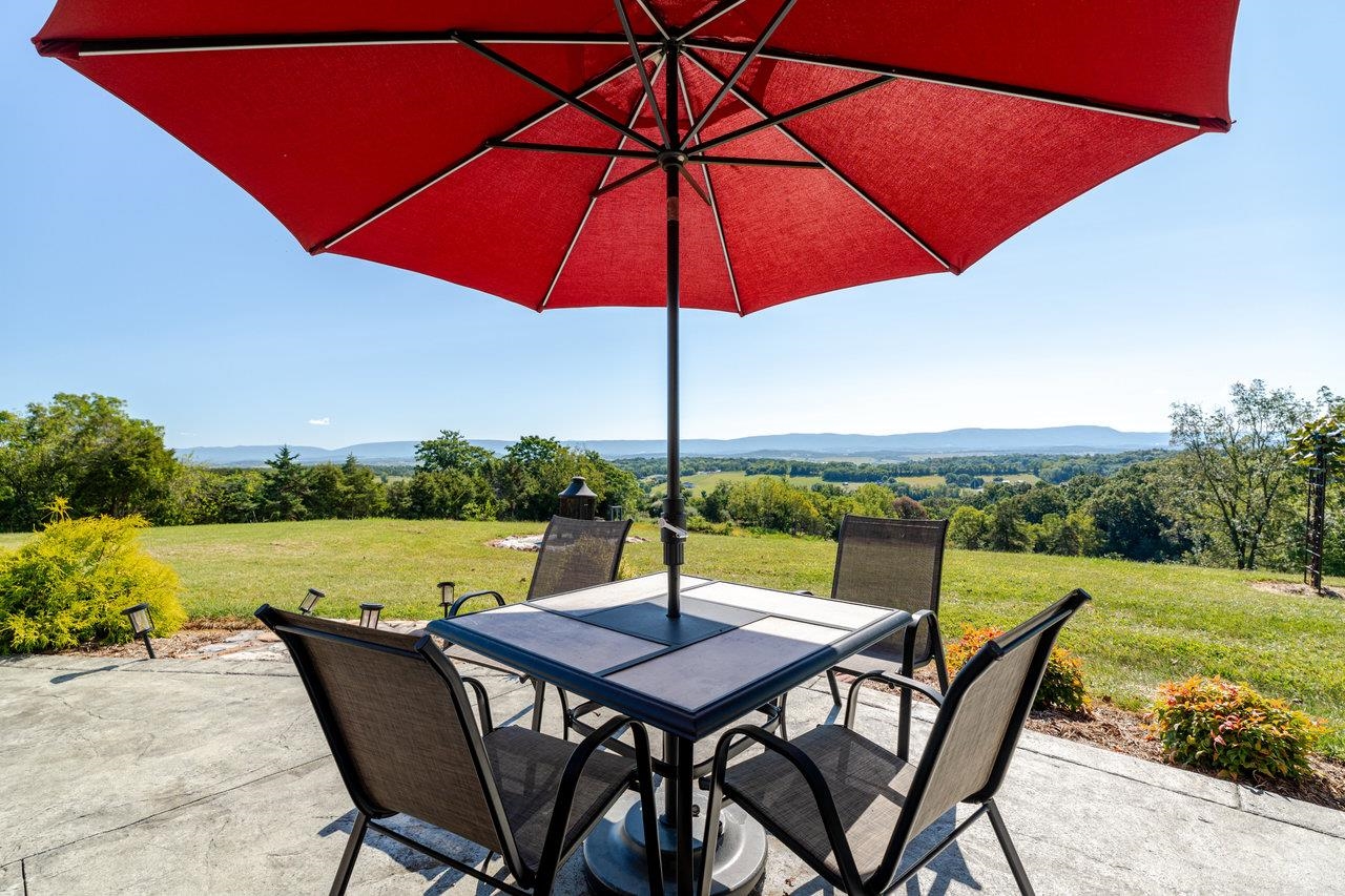 12012 Hollar School Road Linville, VA 22834 - Photo 20 of 75 a view of a swimming pool and outdoor seating