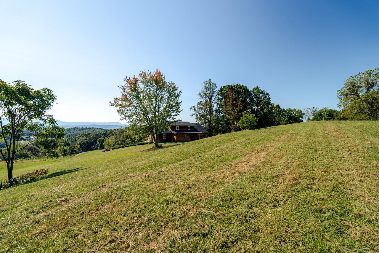 12012 Hollar School Road Linville, VA 22834 - Photo 27 of 75 a view of a field with an trees