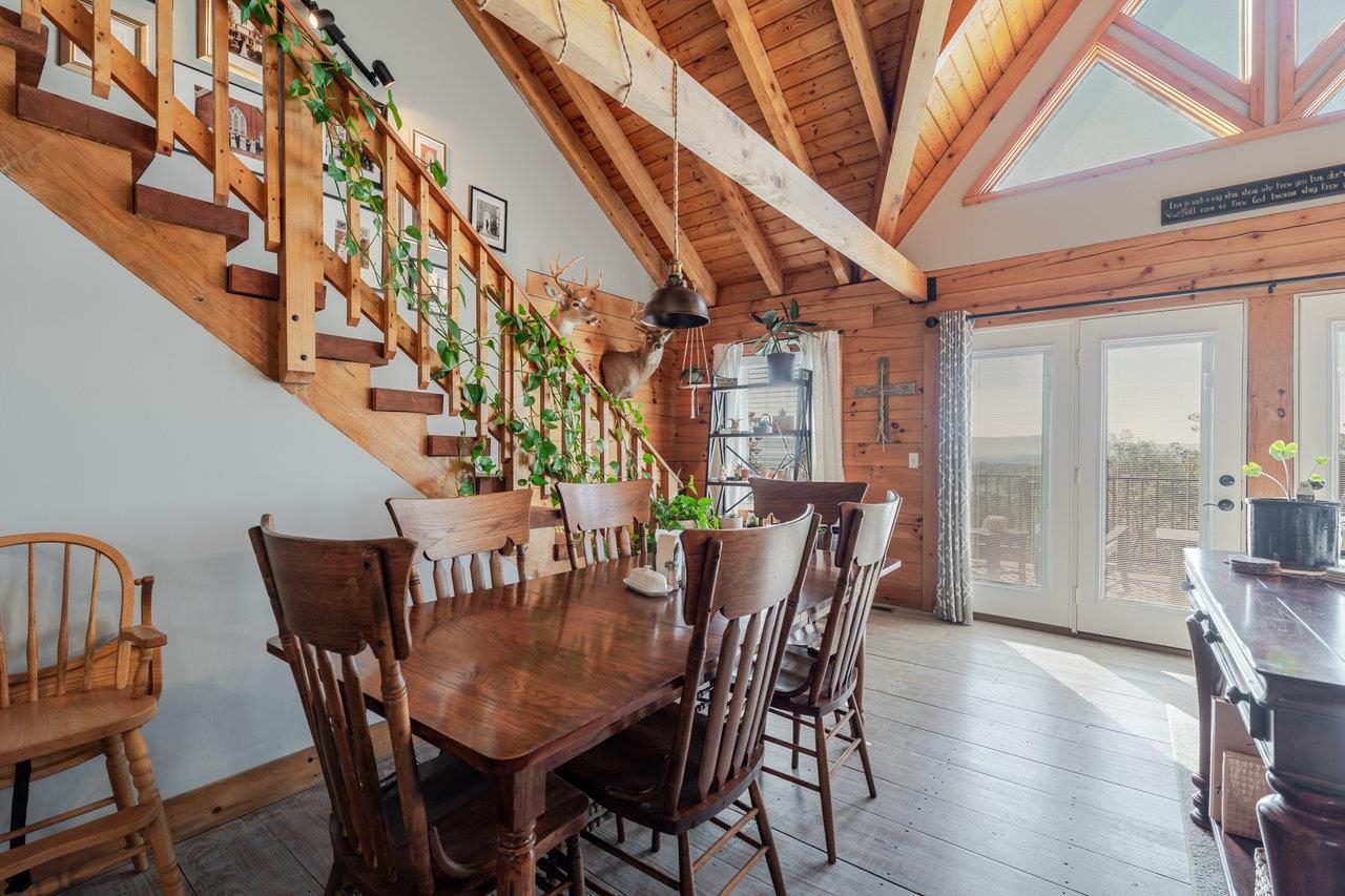 12012 Hollar School Road Linville, VA 22834 - Photo 42 of 75 a view of a dining room with furniture and wooden floor