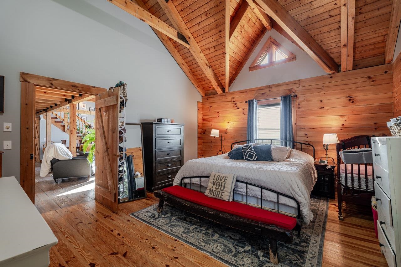 12012 Hollar School Road Linville, VA 22834 - Photo 46 of 75 a bedroom with bed and wooden floor