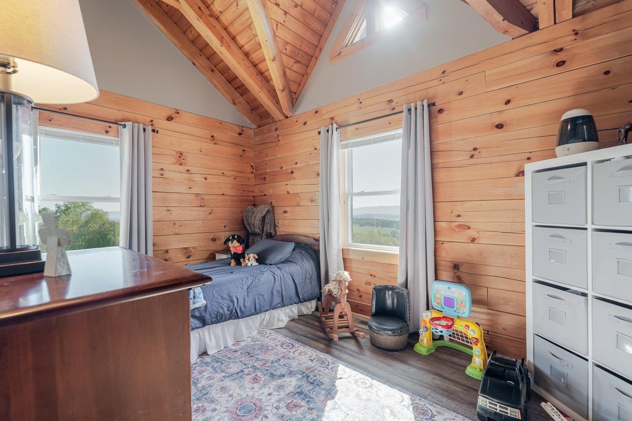 12012 Hollar School Road Linville, VA 22834 - Photo 50 of 75 a living room filled with furniture and a window