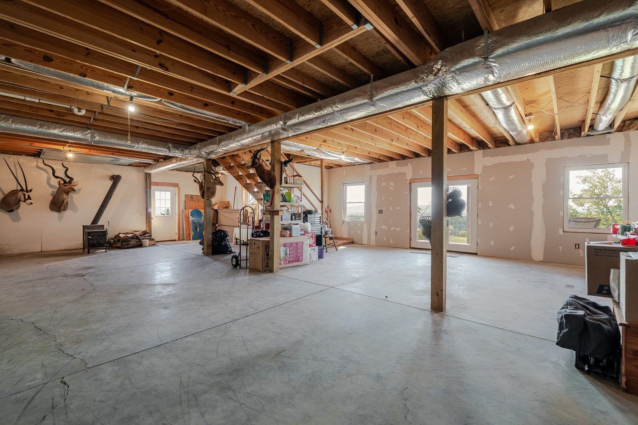 12012 Hollar School Road Linville, VA 22834 - Photo 60 of 75 a view of empty room with wooden floor