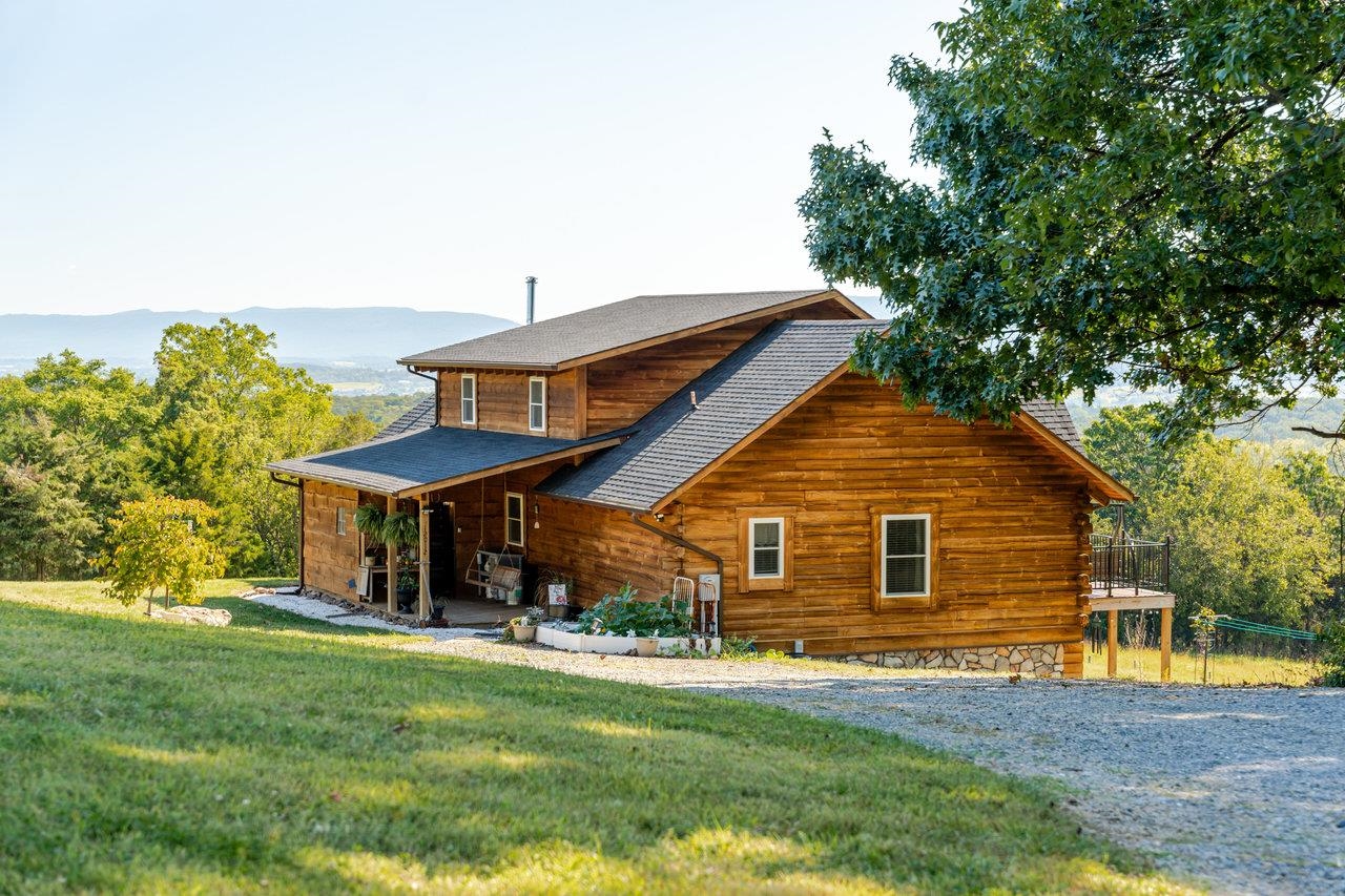 12012 Hollar School Road Linville, VA 22834 - Photo 6 of 75 a front view of a house with a garden