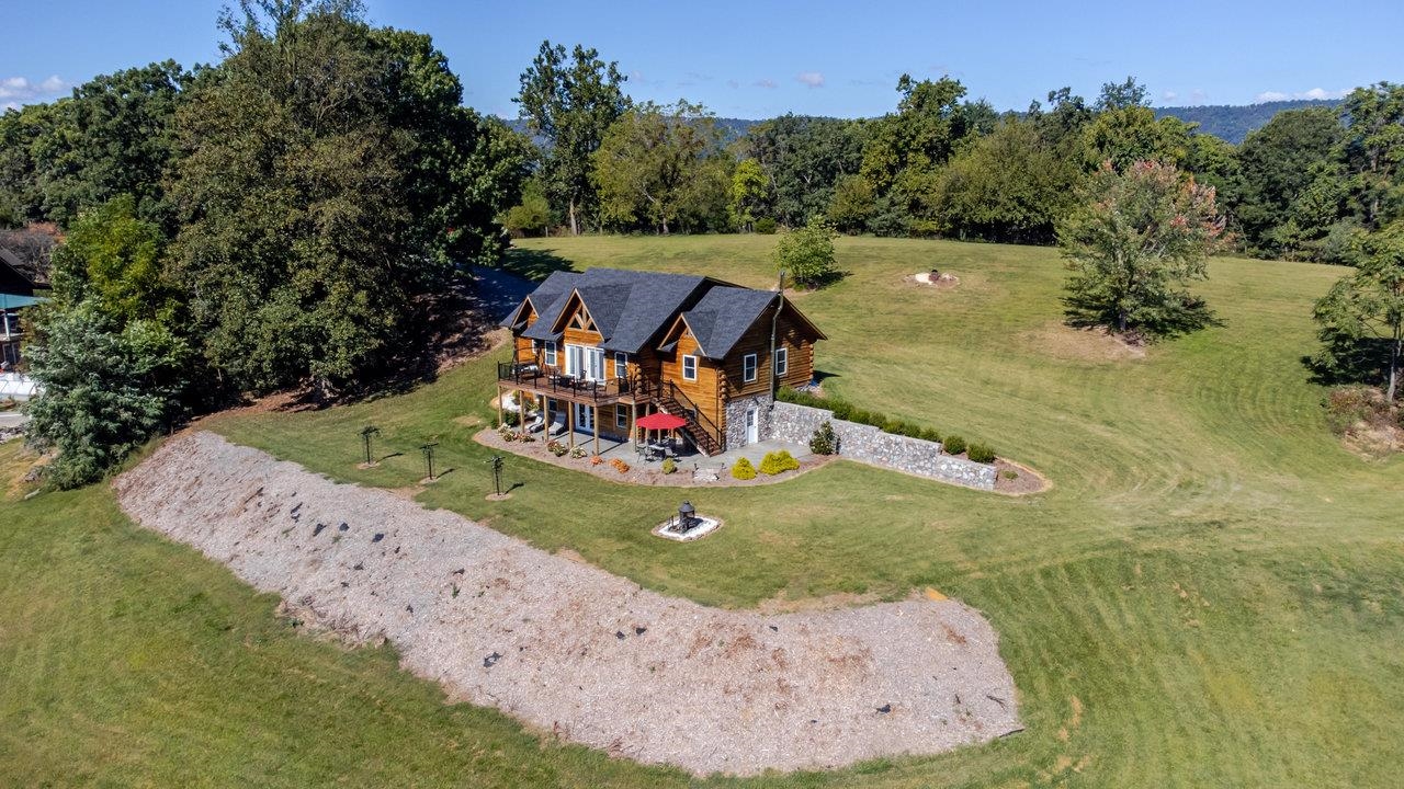 12012 Hollar School Road Linville, VA 22834 - Photo 66 of 75 an aerial view of a house with a yard basket ball court and outdoor seating