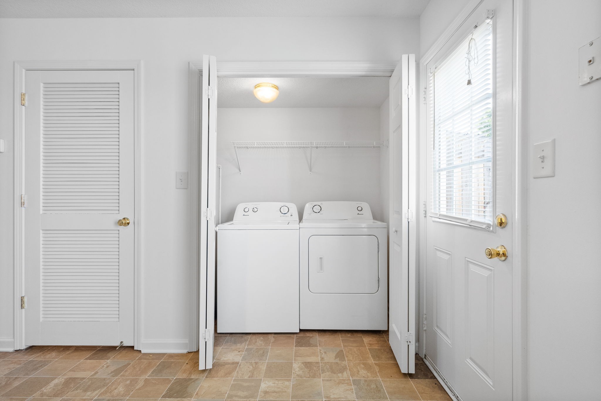 512 Peachers Ridge Road, Unit 3A Clarksville, TN 37042 - Photo 6 of 15 a utility room with dryer and washer