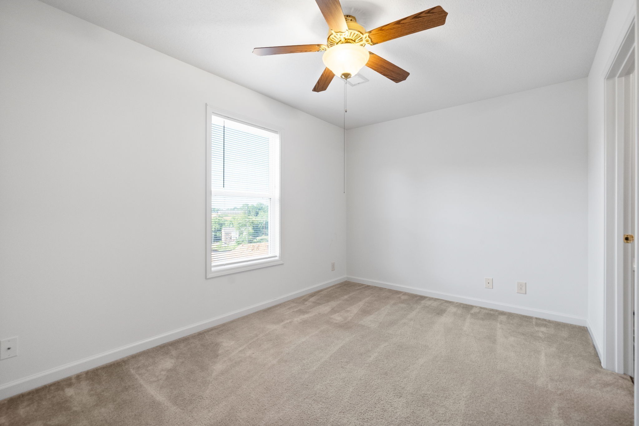 512 Peachers Ridge Road, Unit 3A Clarksville, TN 37042 - Photo 9 of 15 an empty room with windows and fan