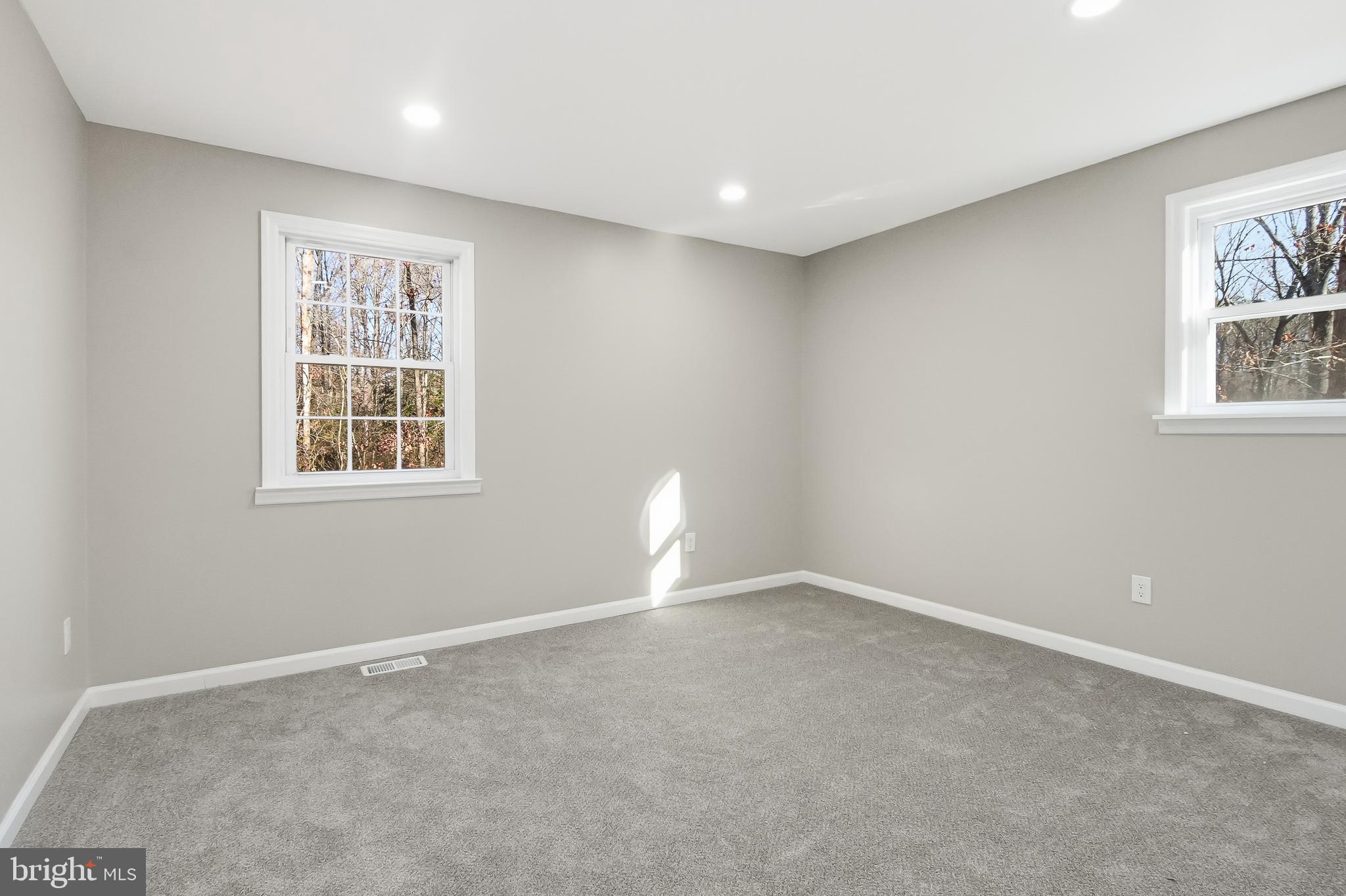 62 Grassy Lake Road Shamong, NJ 08088 - Photo 13 of 25 a view of empty room with windows
