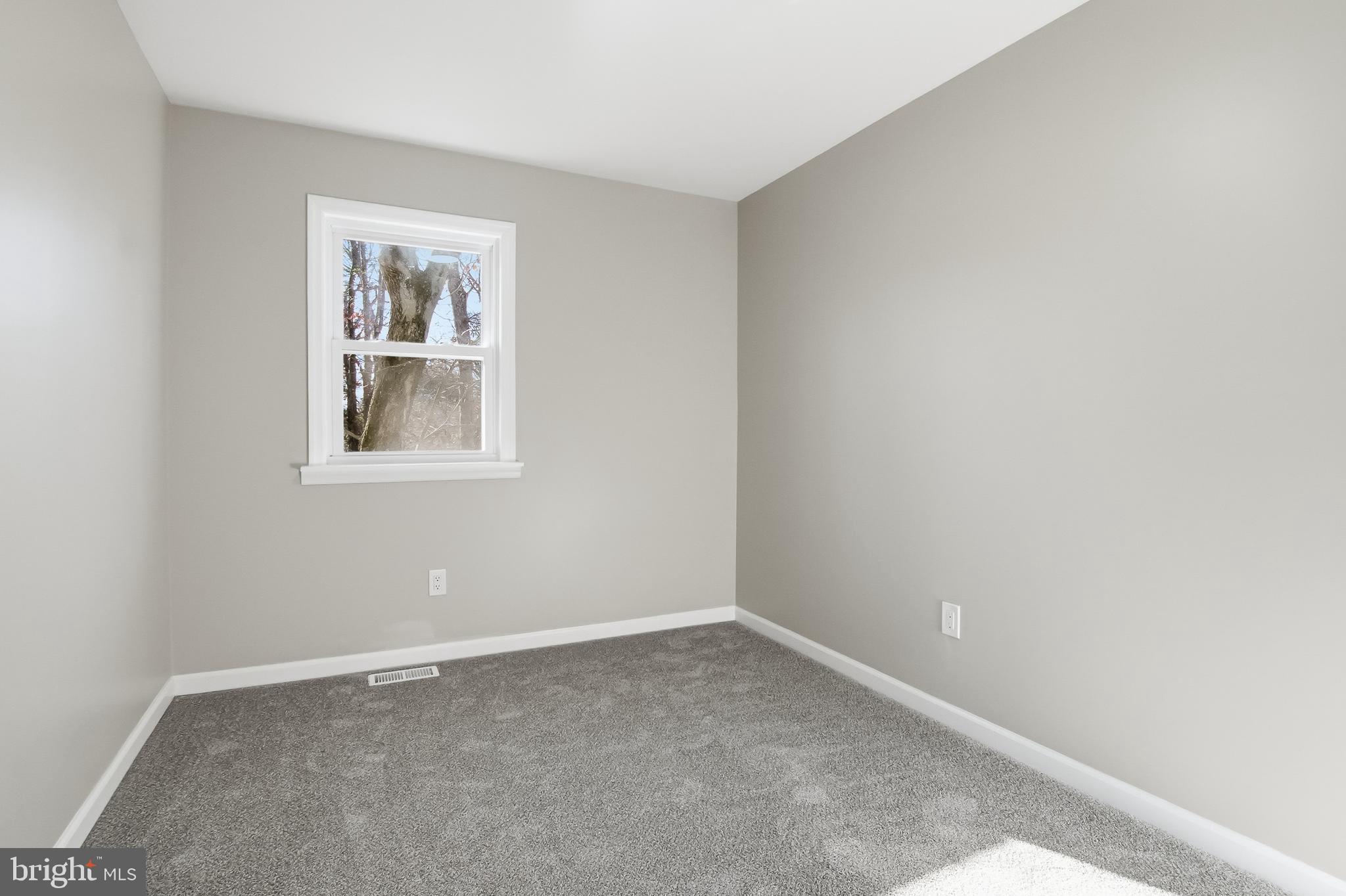 62 Grassy Lake Road Shamong, NJ 08088 - Photo 19 of 25 an empty room with windows