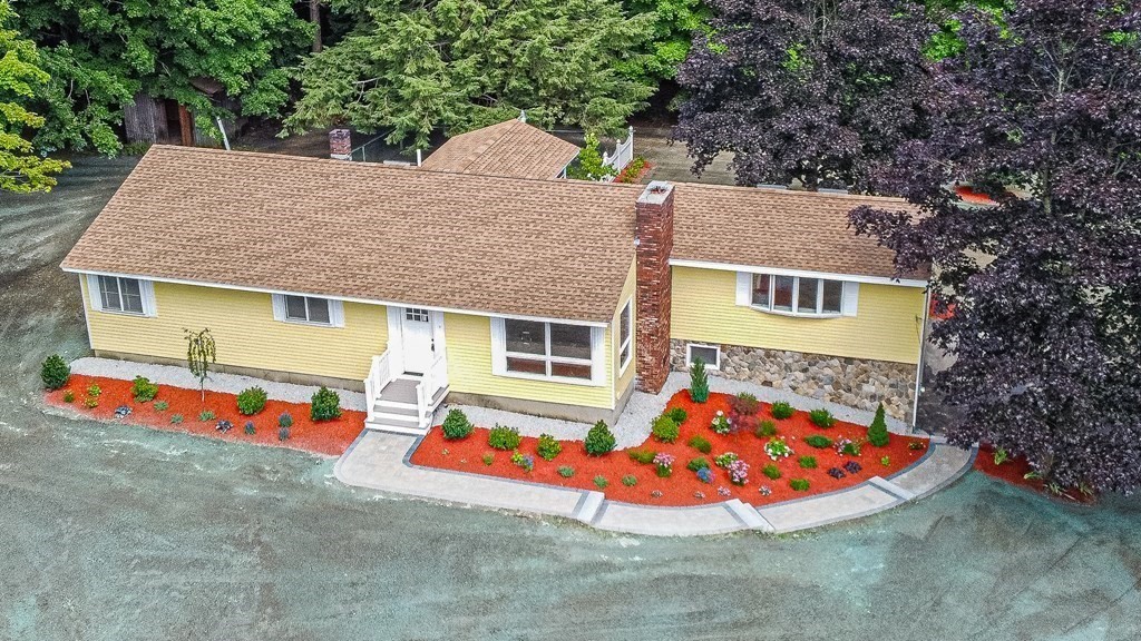 49 Parham Road Tyngsborough, MA 01879 - Photo 1 of 31 front view of a house with a yard