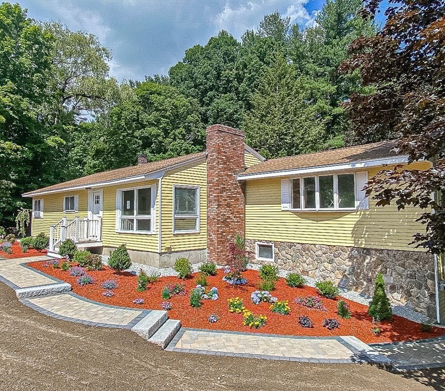 49 Parham Road Tyngsborough, MA 01879 - Photo 3 of 31 front view of a house with a patio