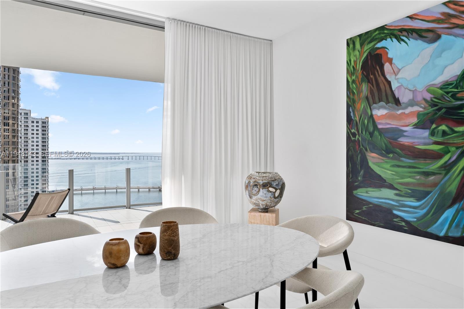 300 Biscayne Blvd Way, Unit 2102 Miami, FL 33131 - Photo 17 of 80 a dining room with furniture and a floor to ceiling window