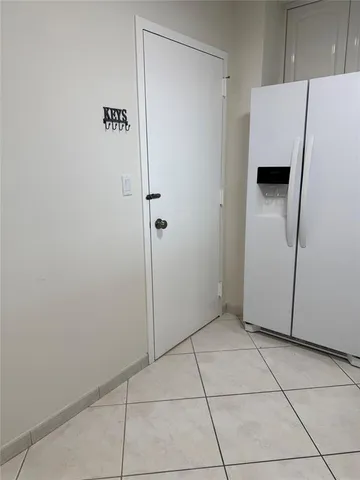 a bathroom with a shower and a toilet