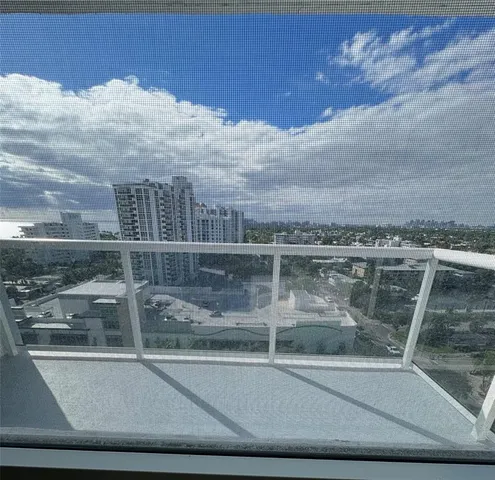 a view of a glass door with a window