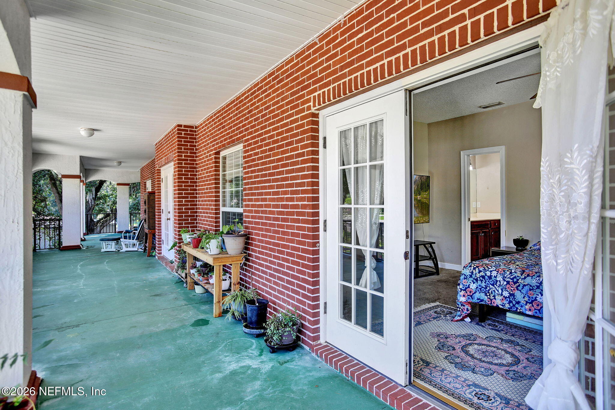 5052 Lourcey Road Jacksonville, FL 32257 - Photo 55 of 75 Balcony to Mini Suite Bedroom