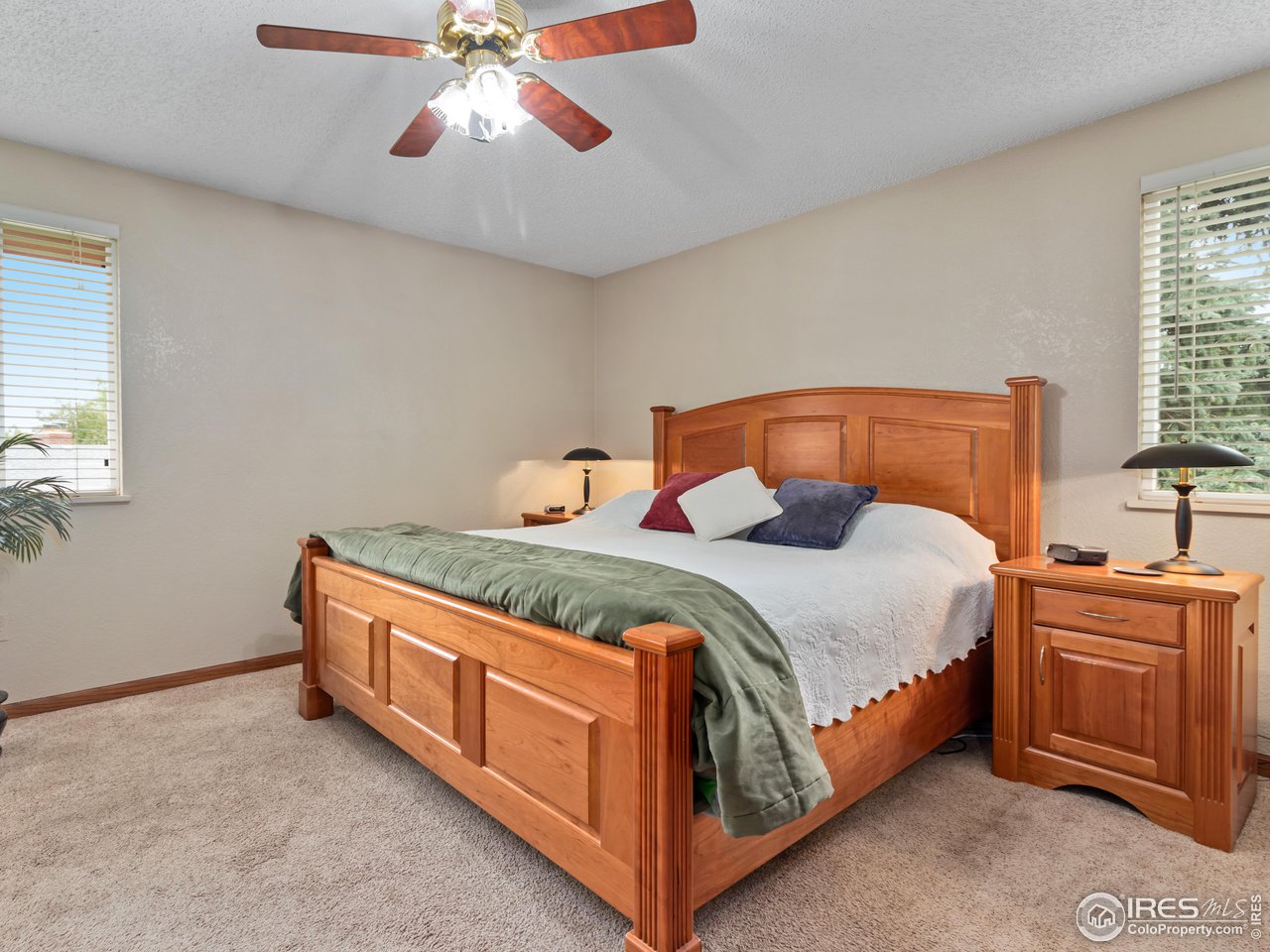 7760 Durham Way Boulder, CO 80301 - Photo 22 of 33 a bedroom with a bed and window