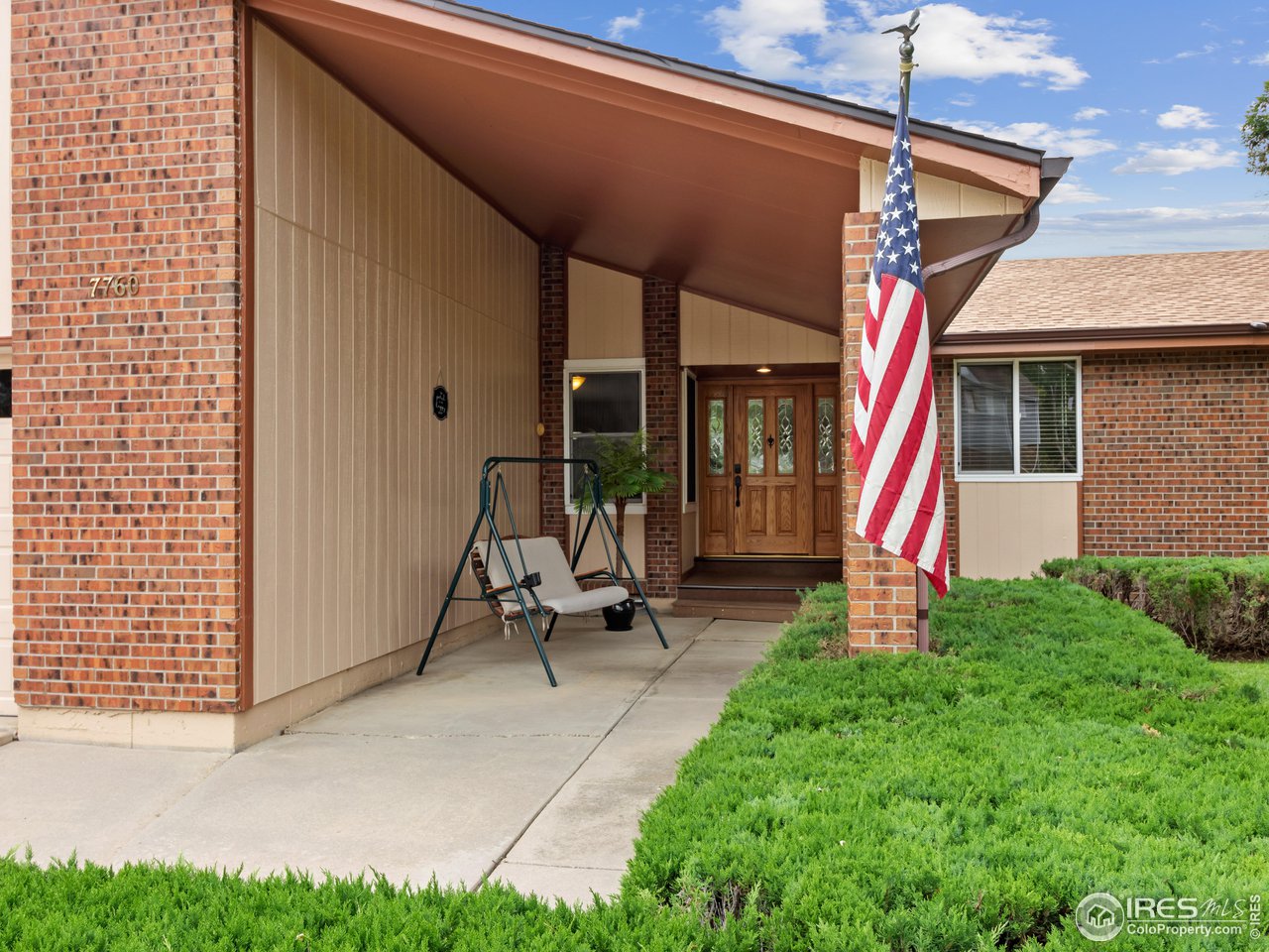 7760 Durham Way Boulder, CO 80301 - Photo 4 of 33 a view of a house with backyard and porch