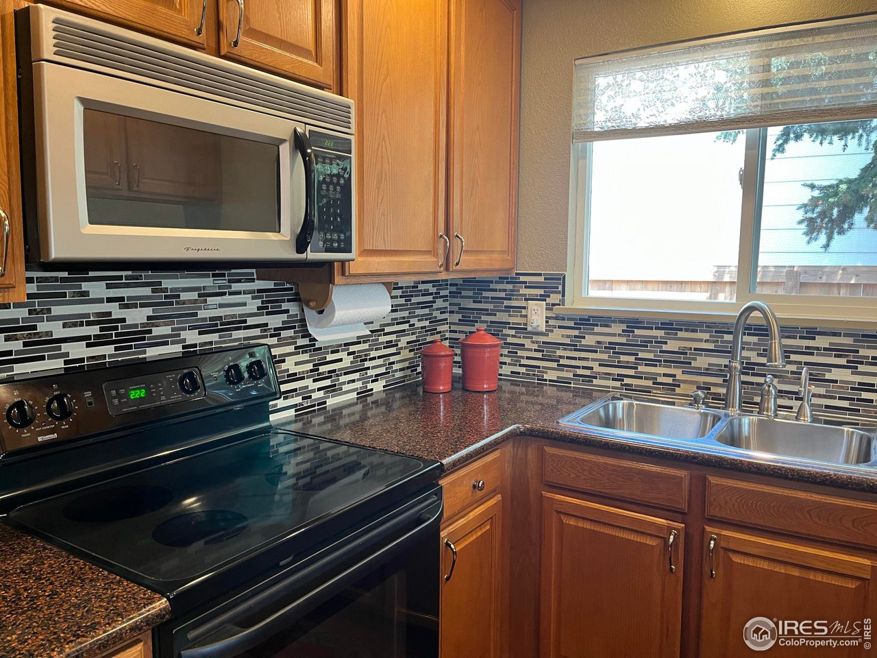 7760 Durham Way Boulder, CO 80301 - Photo 8 of 33 a kitchen with a sink and cabinets