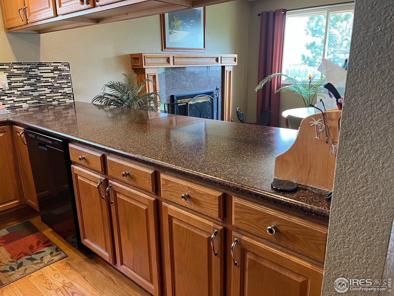 7760 Durham Way Boulder, CO 80301 - Photo 9 of 33 a view of dining room with furniture and a potted plant
