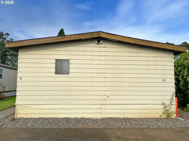 a view of a house with a roof deck